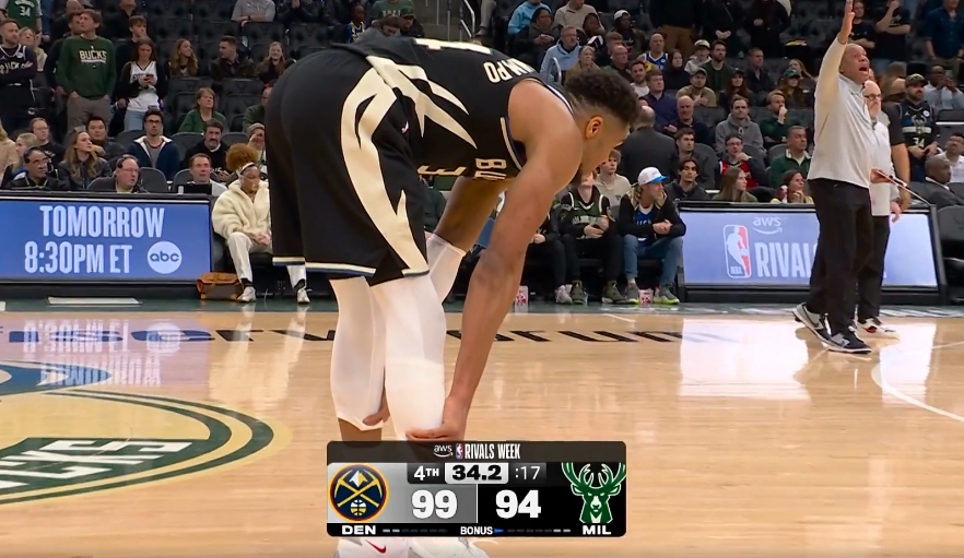 BOB半岛-沮丧！字母哥小腿不舒服啊 走去球员通道又回了替补席！